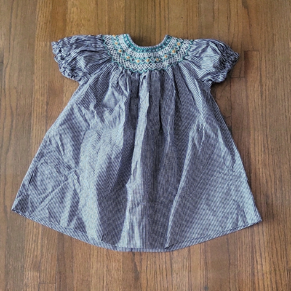 Rosalina Collection Boutique  Black and White Smocked Dress with Elegant Design